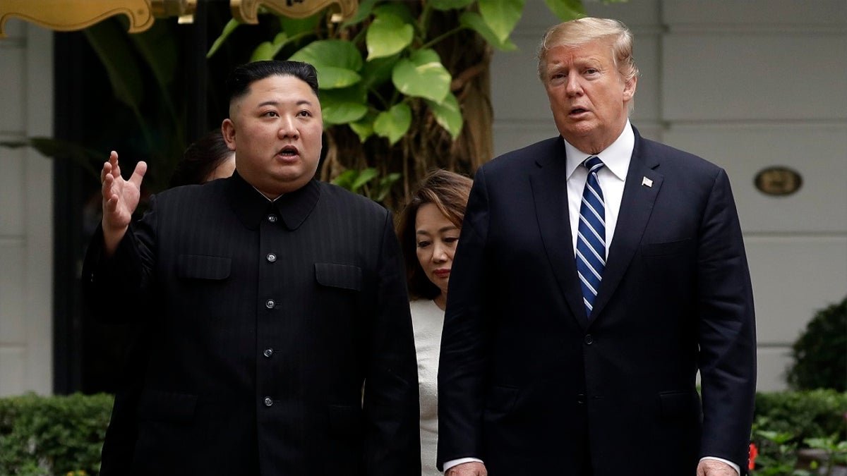 Trump with North Korea's Kim to his right