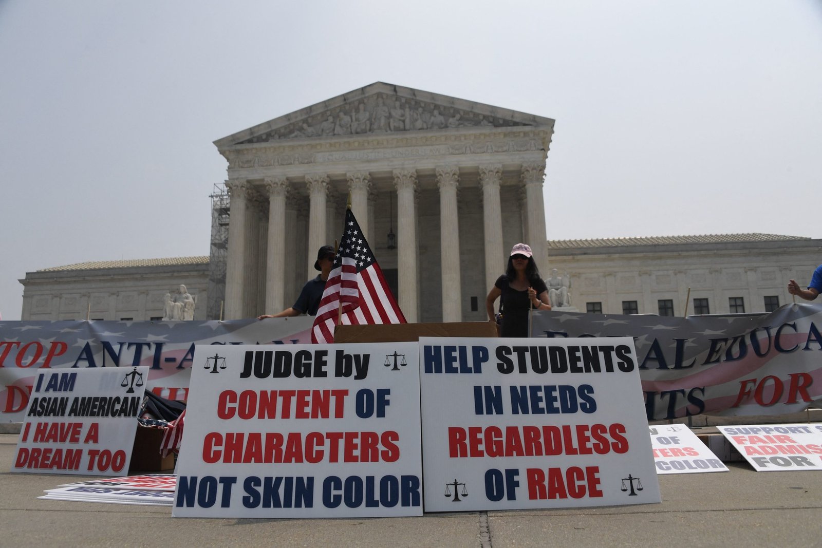 Education supporters demonstrate outside the US Supreme Court on June 29, 2023, in Washington, DC. The US Supreme Court on Thursday banned the use of race and ethnicity in university admissions, dealing a major blow to a decades-old practice that boosted educational opportunities for African-Americans and other minorities. (Photo by OLIVIER DOULIERY/AFP via Getty Images)