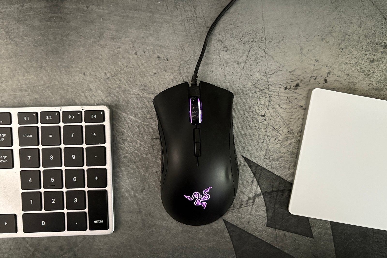 Razer DeathAdder Essential Gaming Mouse next to a keyboard