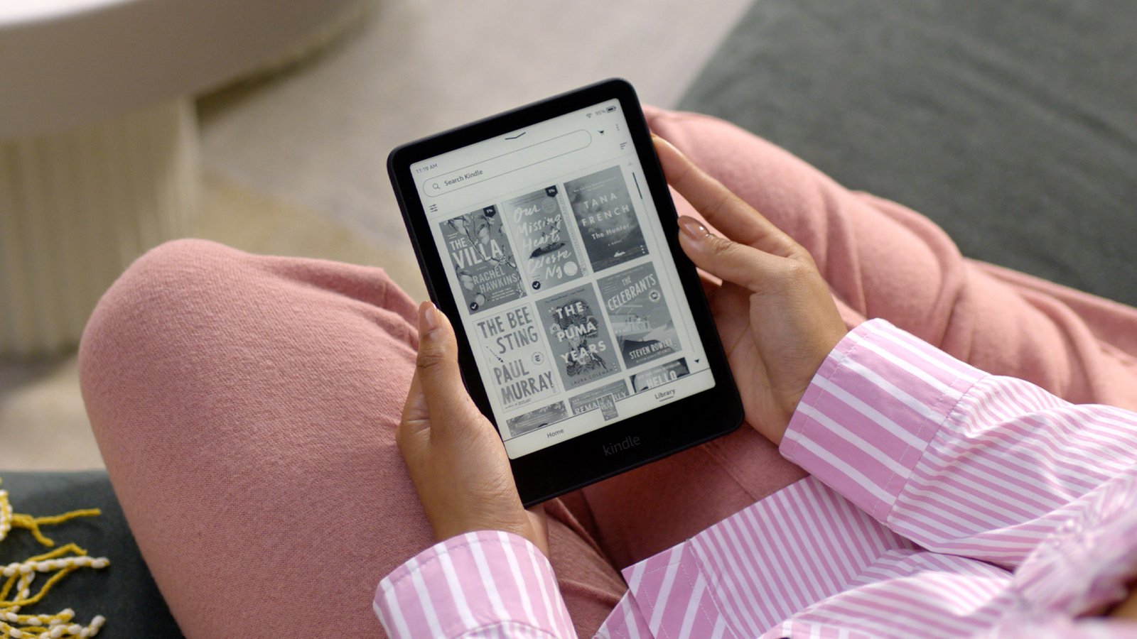 person holding kindle