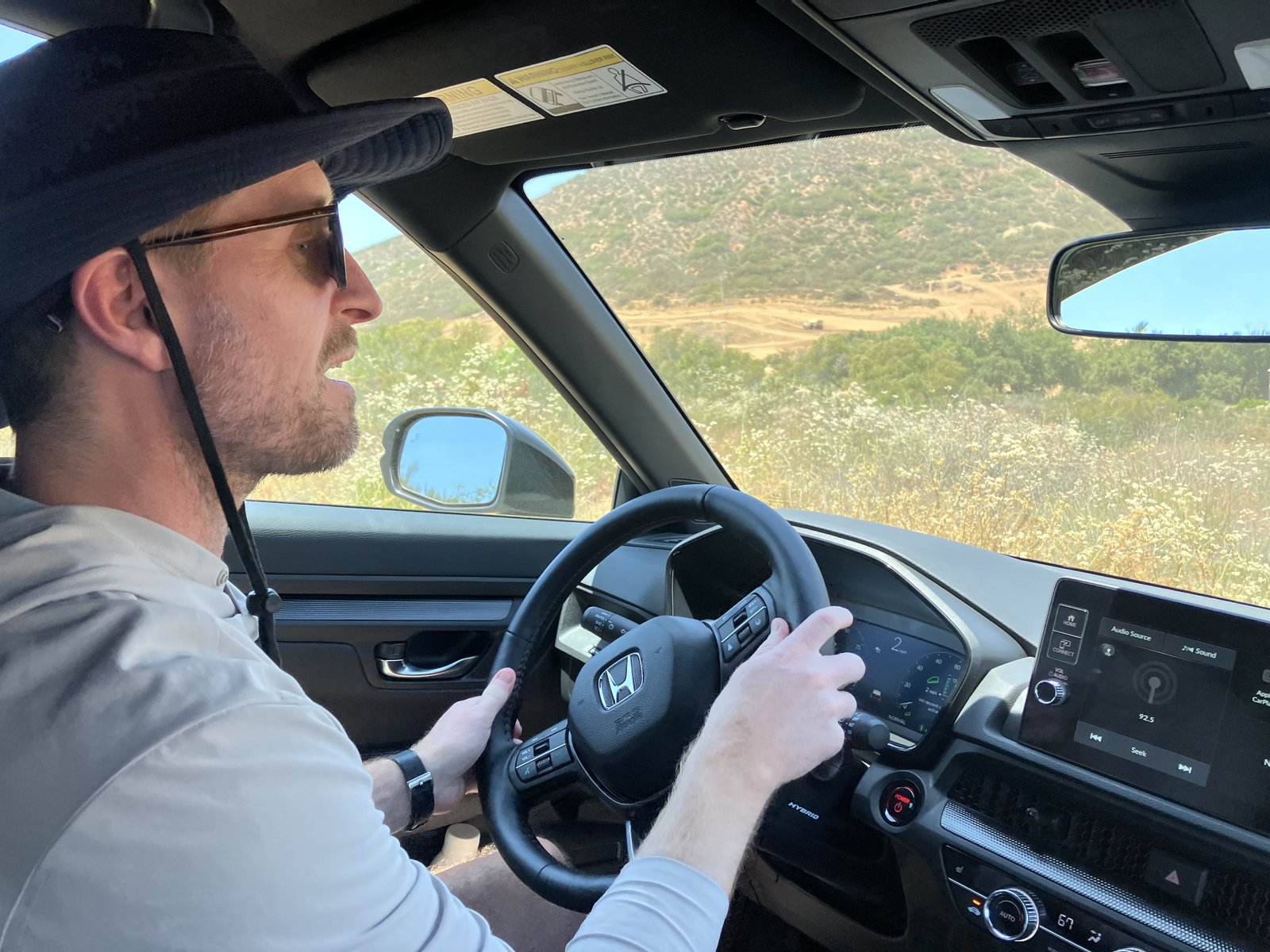 a driver going down a steep hill