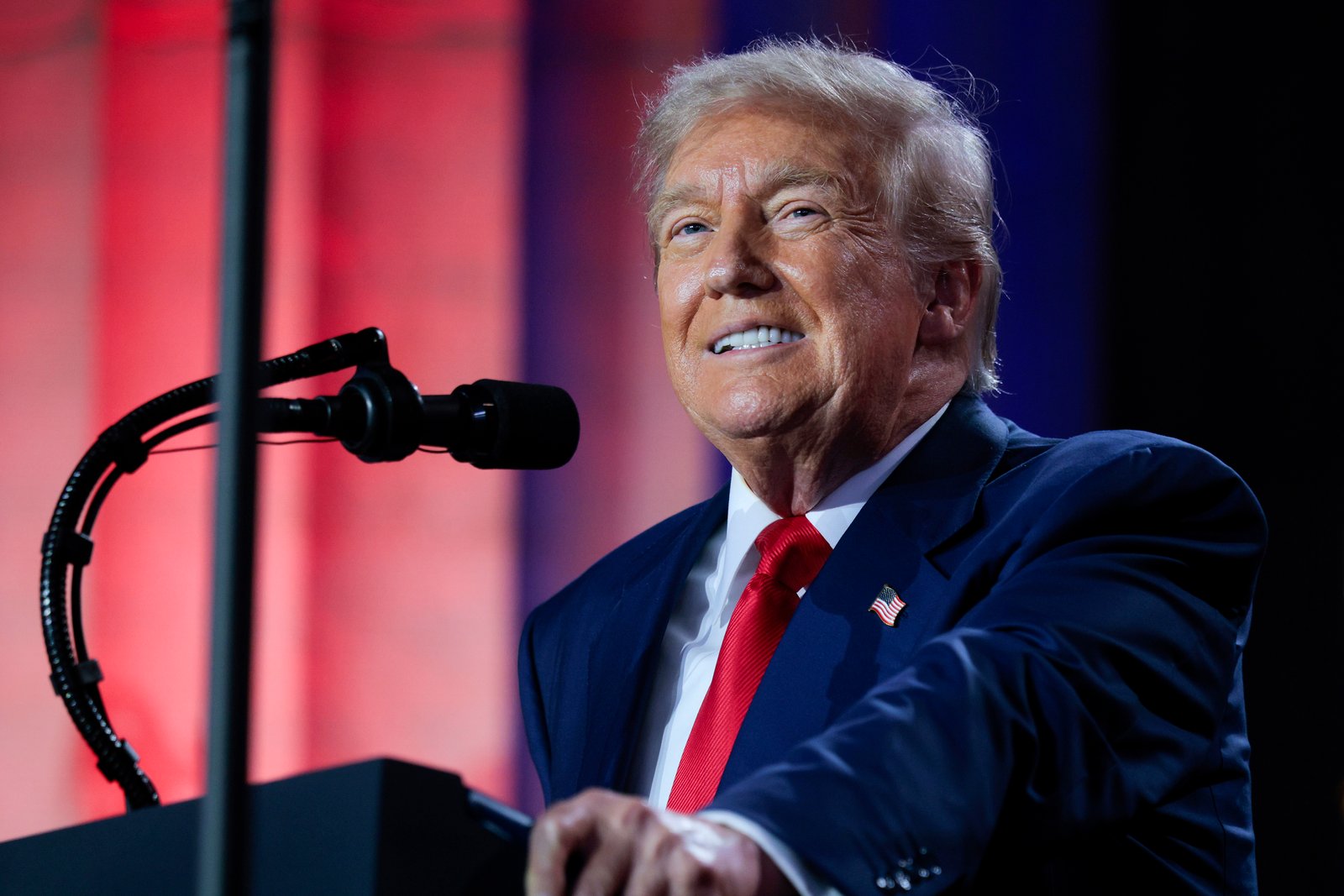 President Trump speaking at a podium.