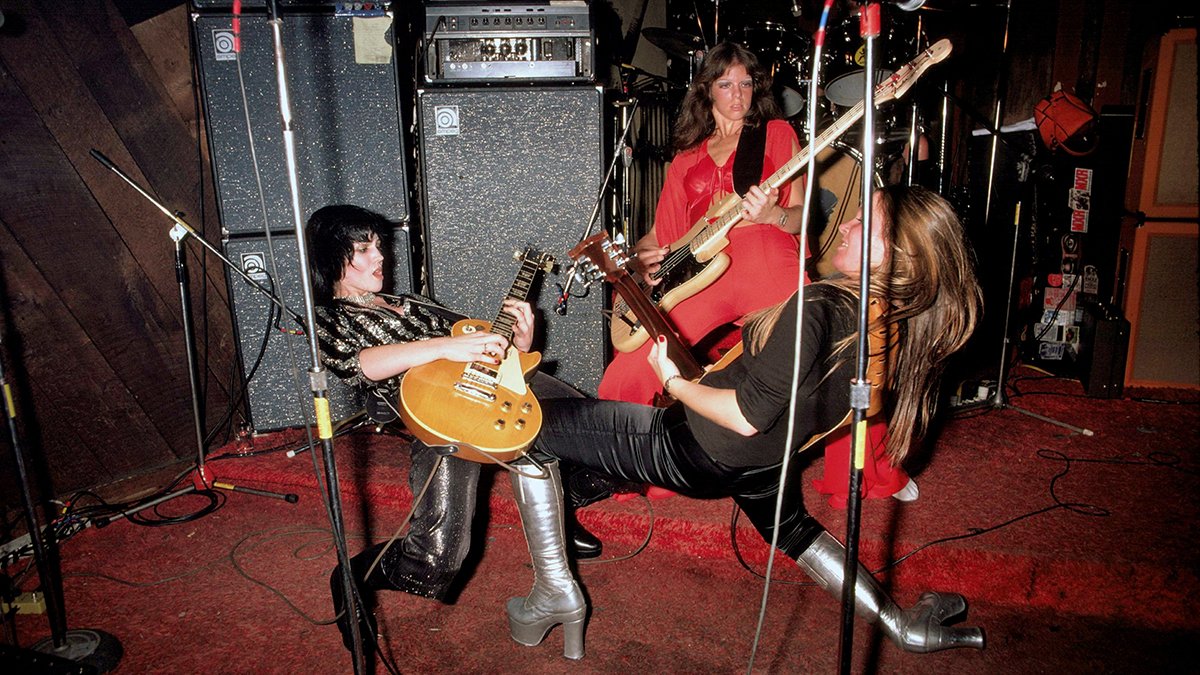Members of the Rock group The Runaways perform live at CBGB's club in New York on August 02 1976. L-R Joan Jett, Jackie Fox, Lita Ford