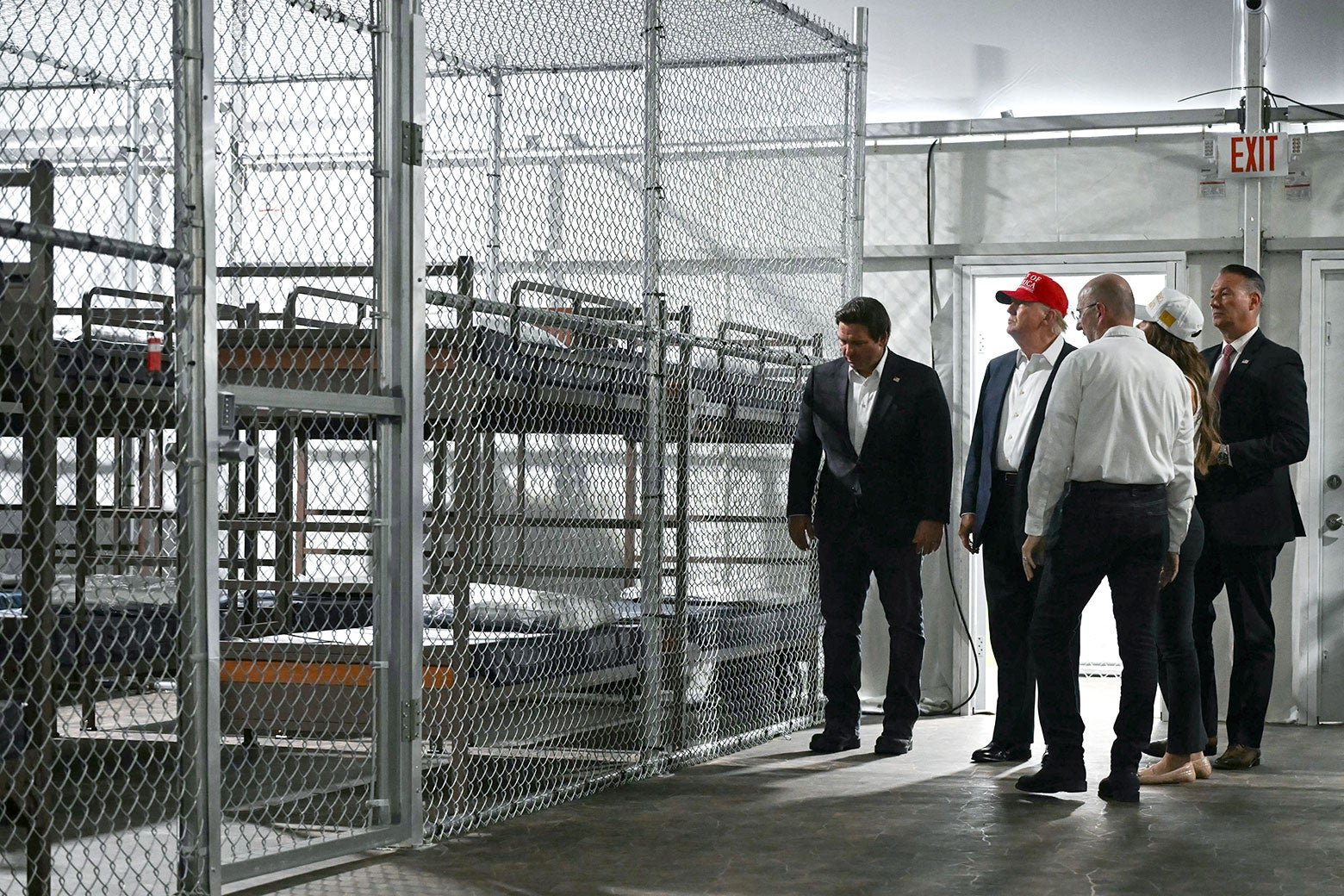 Donald Trump, Ron DeSantis and others tour Alligator Alcatraz, a concentration camp for immigrants in Florida.