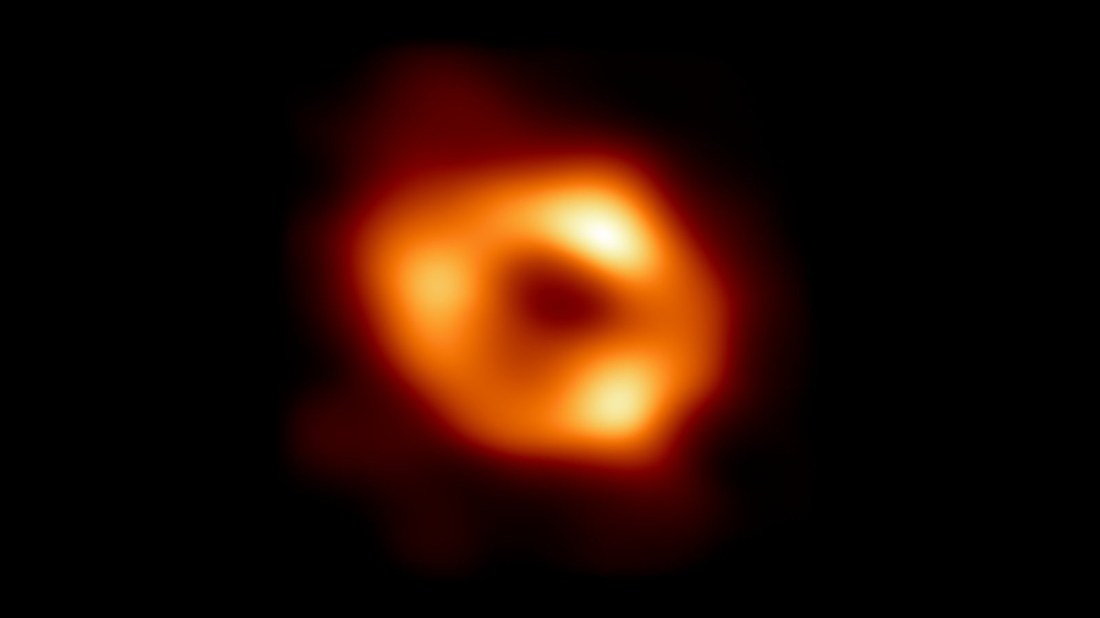 A blobby orange ring against a black background.