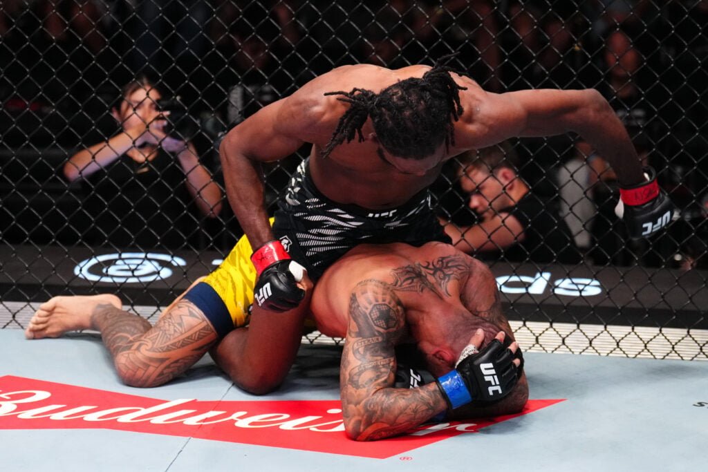 Neil Magny punches Elizeu Zaleski dos Santos on the ground at UFC Vegas 108
