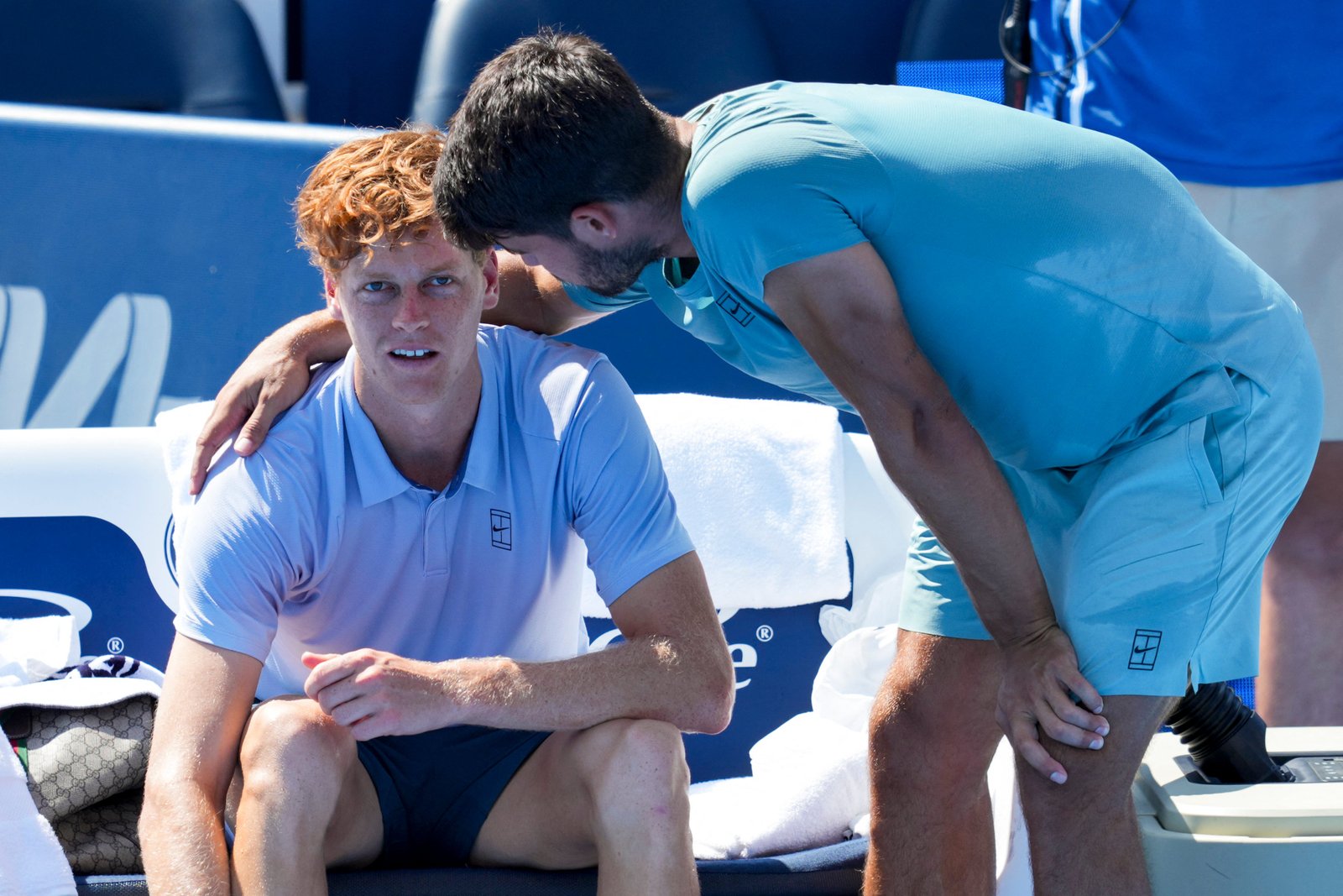 Carlos Alcaraz comforts Jannik Sinner after his retirement from the Cincinnati Open final
