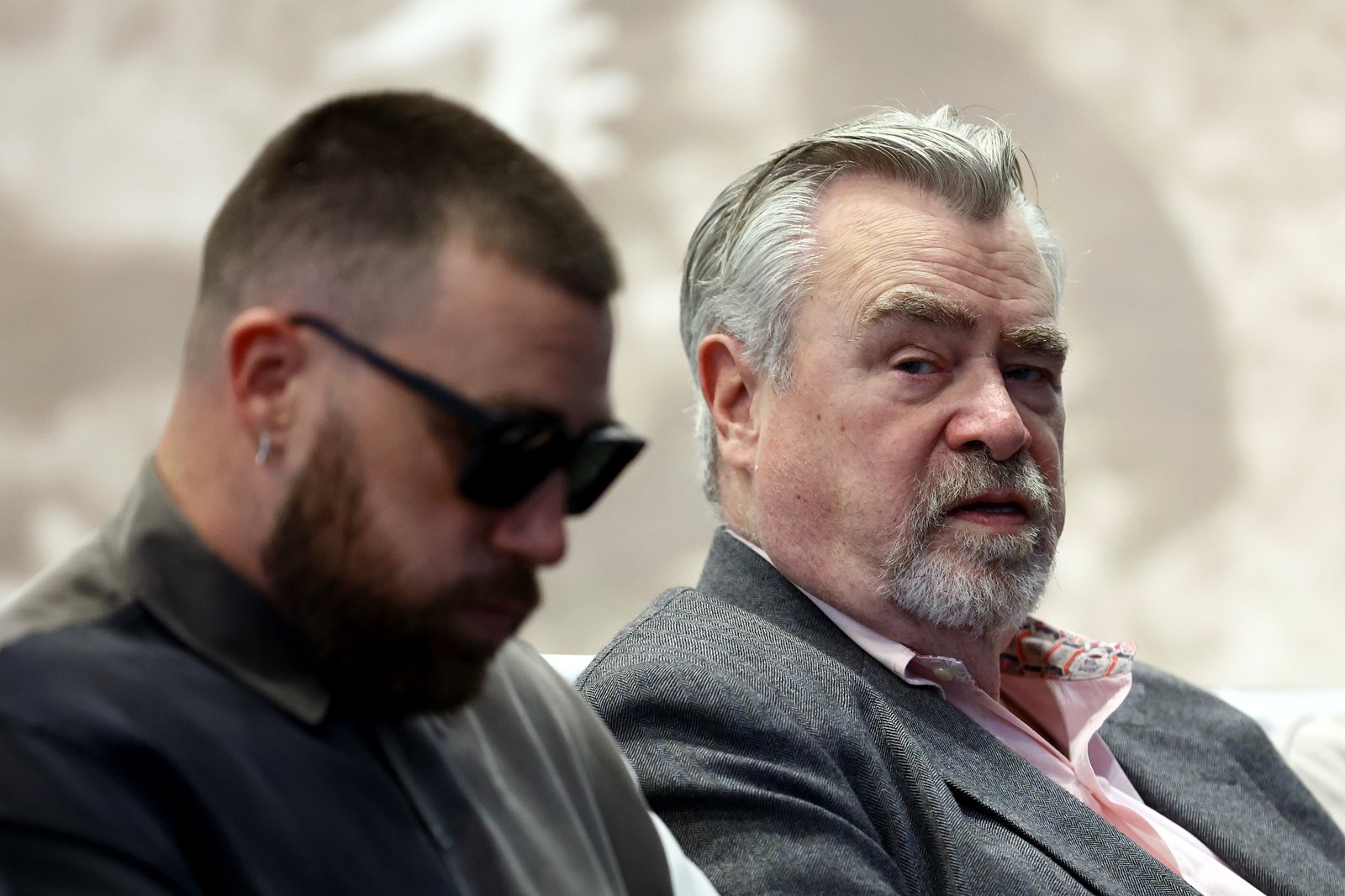 Travis and Ed Kelce at Jason Kelce's NFL retirement announcement in 2024