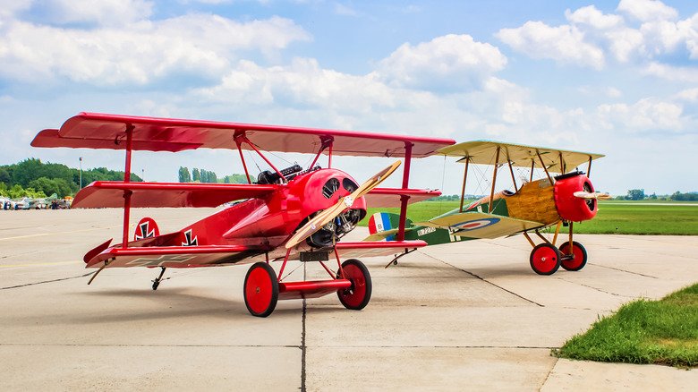 fokker dr 1 and a Sopwith Camel on display at an airshow